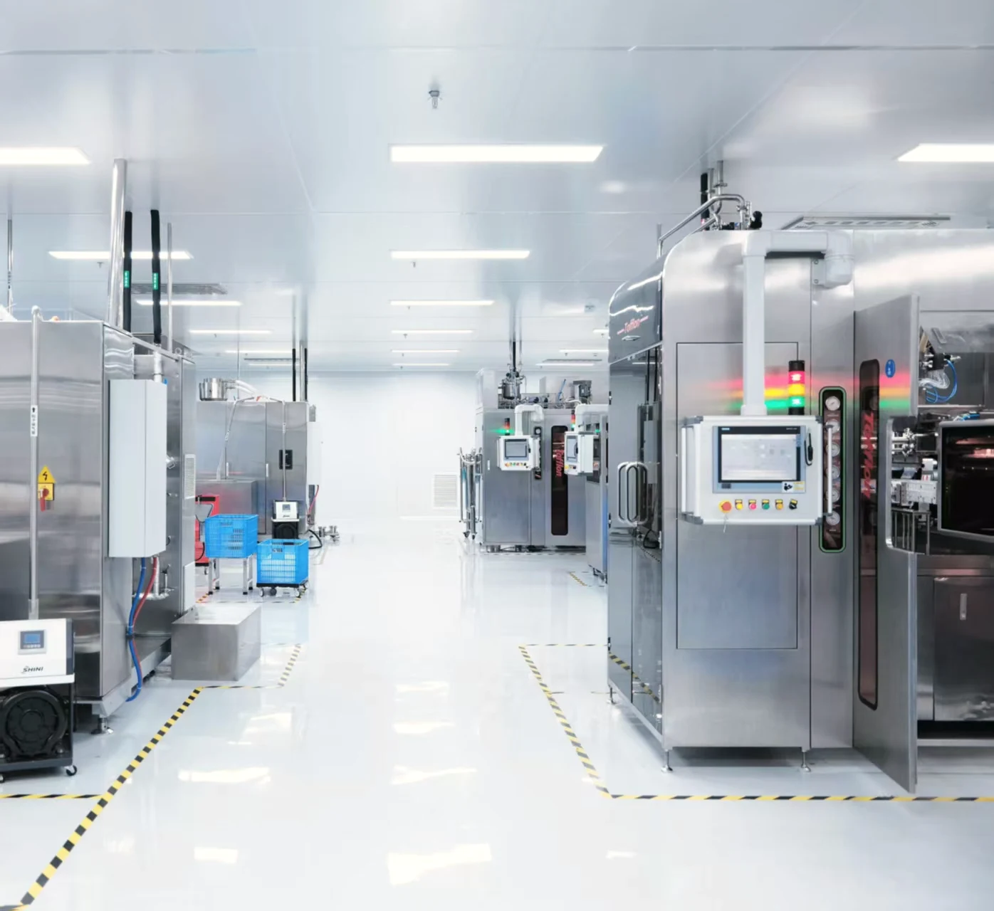 Production equipment along the factory aisle