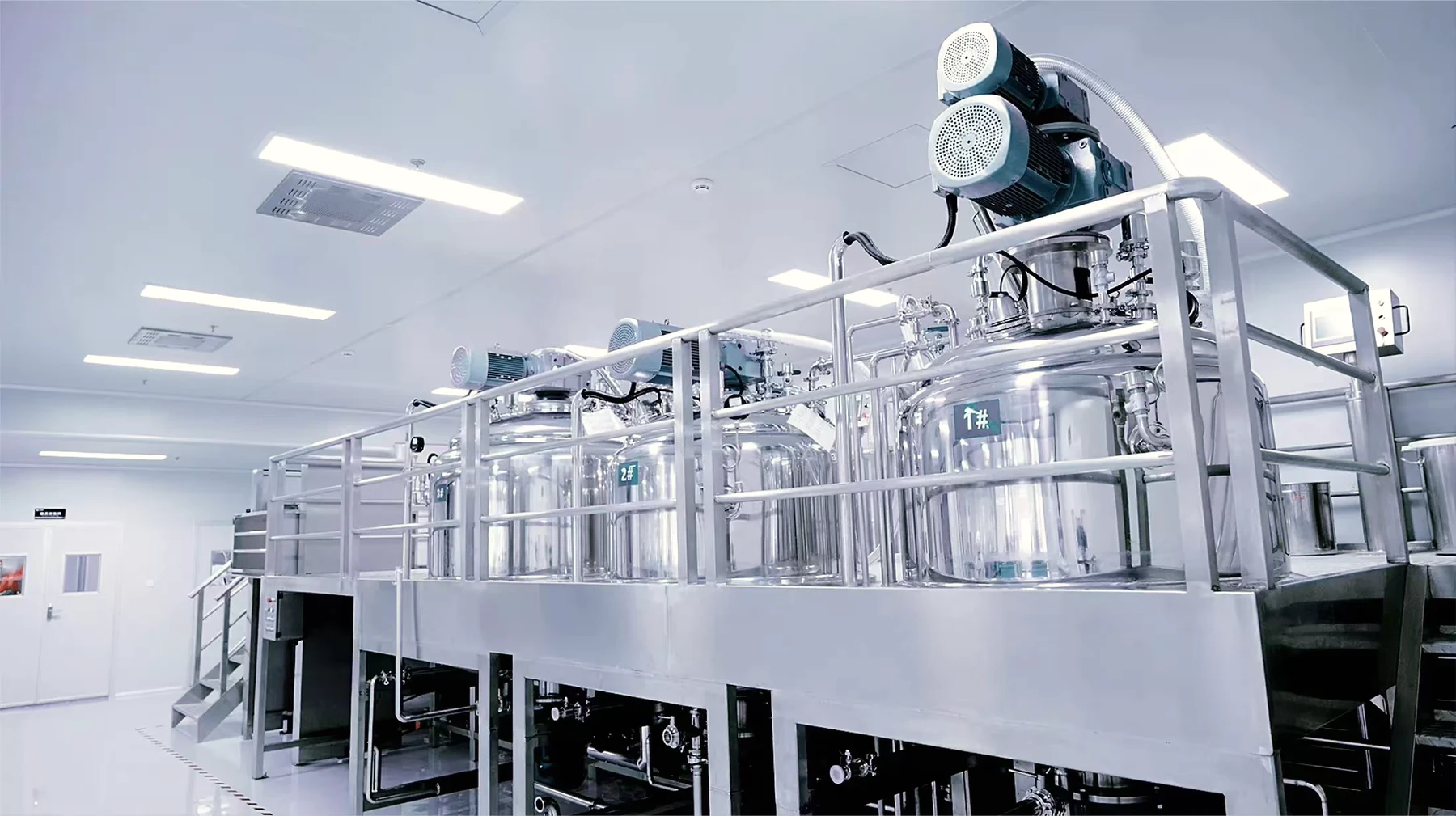 Stainless-steel mixing vessels and service platform